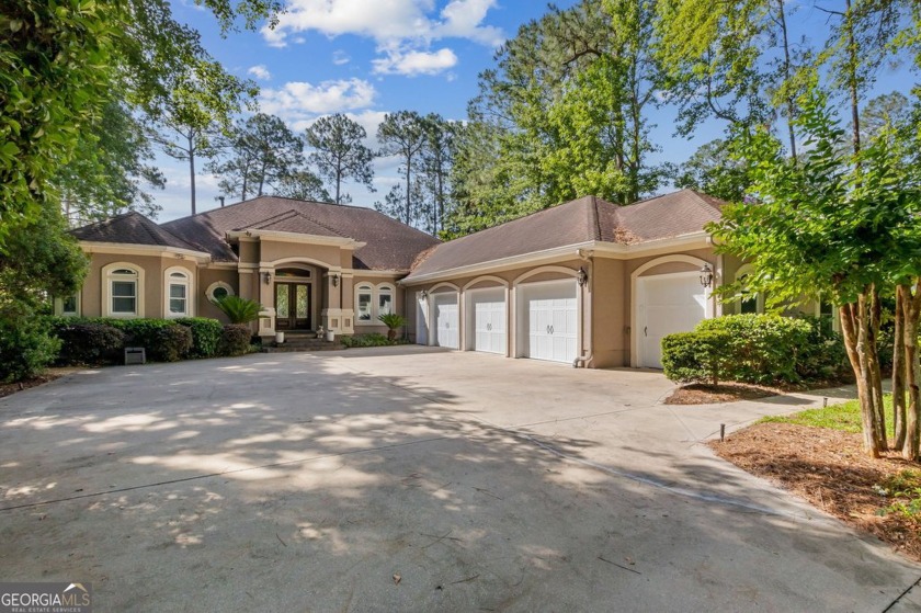 Enjoy serene views of the marsh and the golf course in this - Beach Home for sale in Saint Marys, Georgia on Beachhouse.com