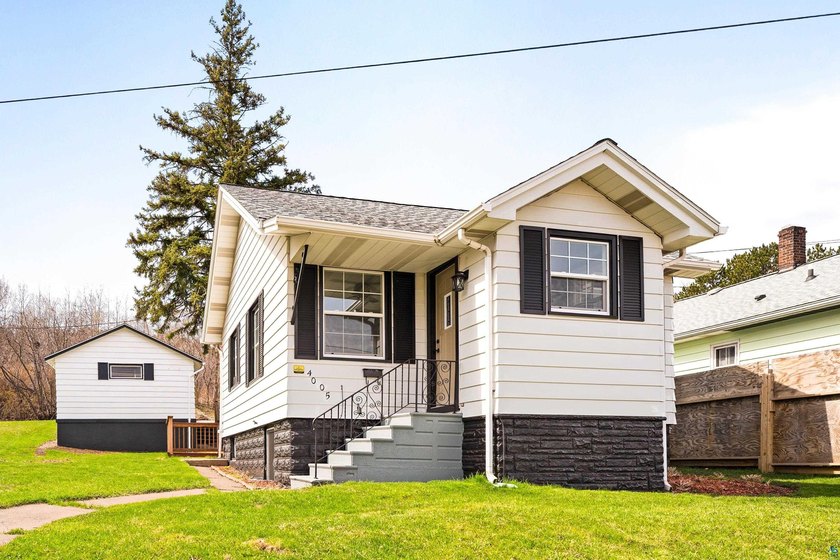 Exceptional craftsmanship shines throughout this completely - Beach Home for sale in Duluth, Minnesota on Beachhouse.com