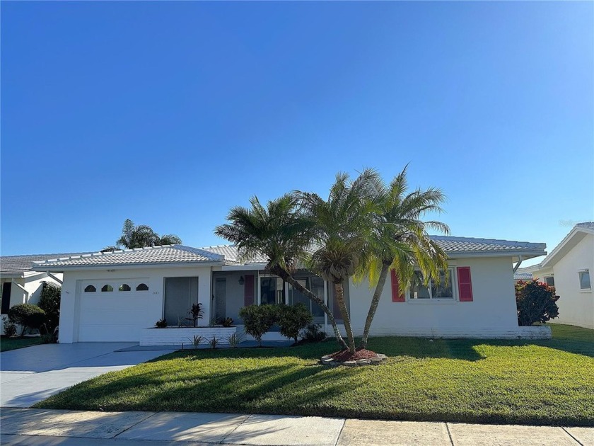 Nestled in the heart of The Mainlands, this stunning dream home - Beach Home for sale in Pinellas Park, Florida on Beachhouse.com