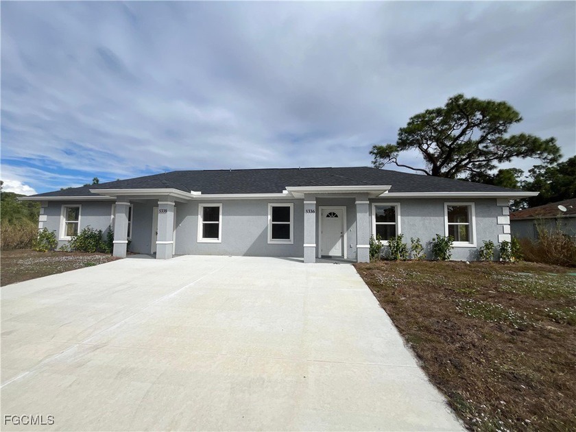 Brand-new beautiful duplex - move-in ready! This stunning new - Beach Home for sale in Lehigh Acres, Florida on Beachhouse.com