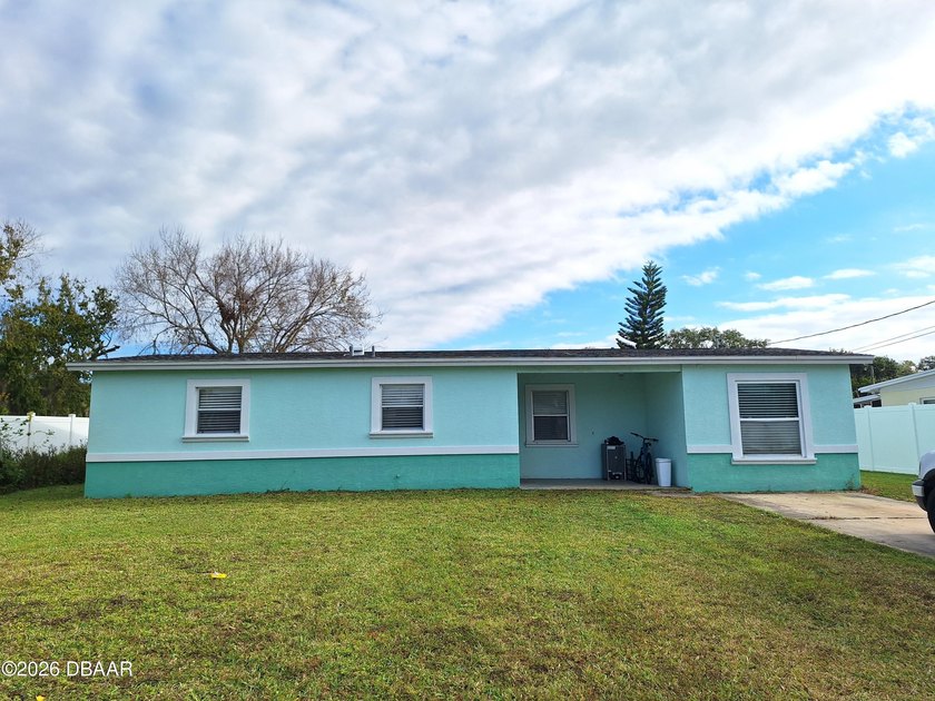 Recently remodeled home with large back yard and mostly white - Beach Home for sale in New Smyrna Beach, Florida on Beachhouse.com