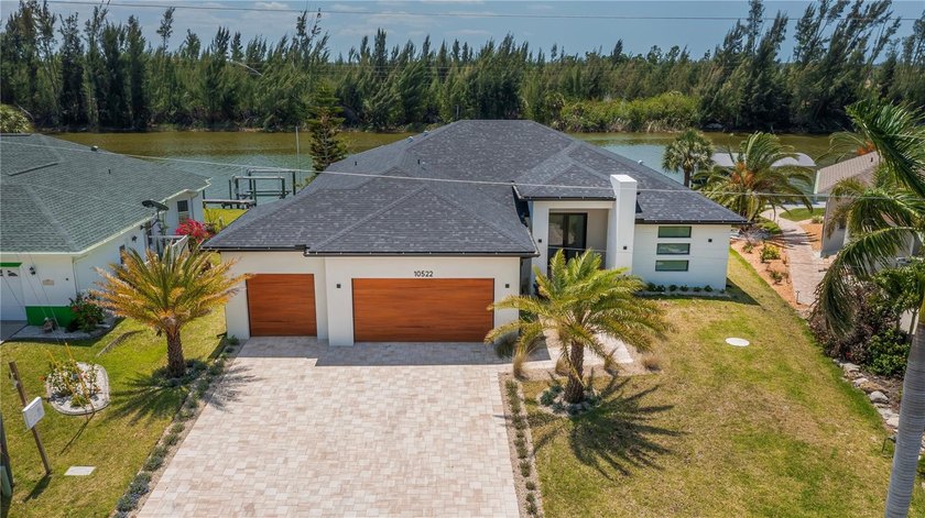 EXPERIENCE UNPARALLELED SAILBOAT ACCESS in this stunning custom - Beach Home for sale in Port Charlotte, Florida on Beachhouse.com