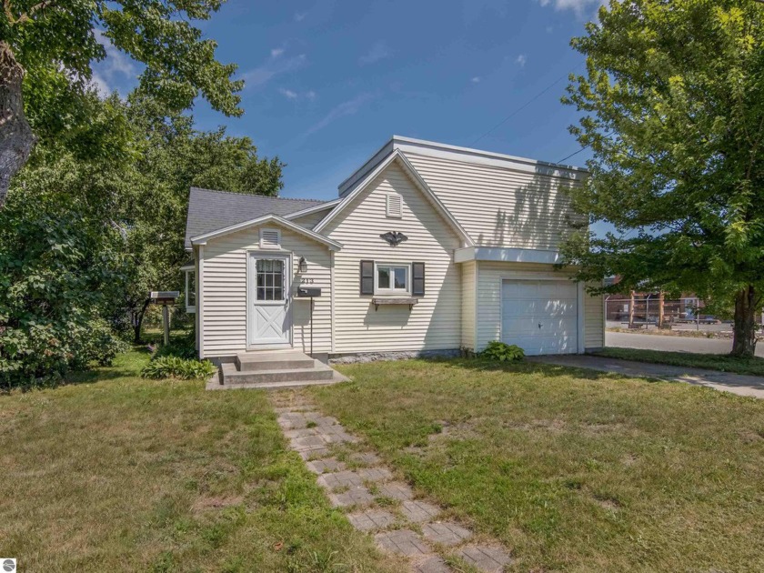 Located in the heart of Traverse City, this 3BR/1BA home offers - Beach Home for sale in Traverse City, Michigan on Beachhouse.com