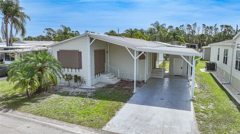 Experience RESORT-STYLE LIVING in this beautifully maintained - Beach Home for sale in Port Charlotte, Florida on Beachhouse.com