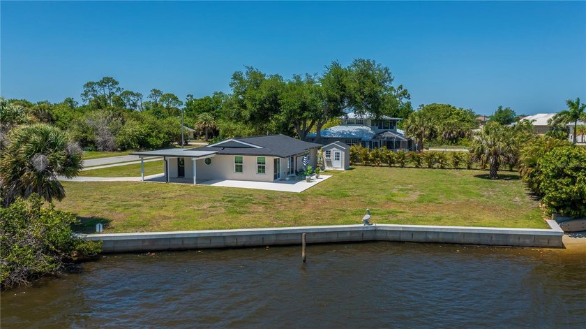 Experience the ultimate in SERENE saltwater lake living with one - Beach Home for sale in Port Charlotte, Florida on Beachhouse.com