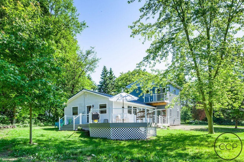 Charming Lake Michigan retreat with deeded access.
Enjoy the - Beach Home for sale in Montague, Michigan on Beachhouse.com