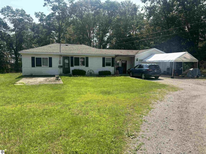 3 Bedroom ranch home sits on 1 acre property close to the - Beach Home for sale in Oscoda, Michigan on Beachhouse.com