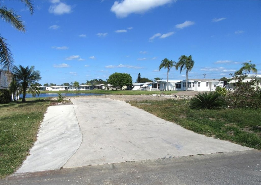 Rarely available lakefront lot to put a new home on in the - Beach Lot for sale in North Port, Florida on Beachhouse.com