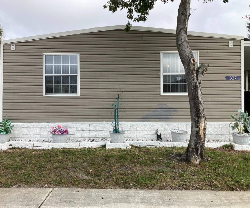 This 4 br. 2 ba. home is listed in Kings Manor, an all age - Beach Home for sale in Largo, Florida on Beachhouse.com