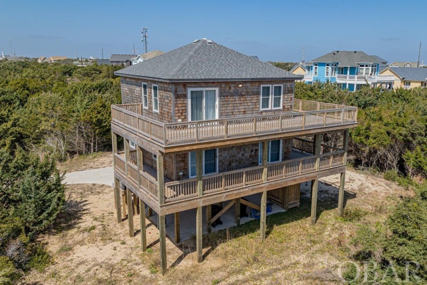 Nestled just two lots away from the oceanfront in the serene - Beach Home for sale in Hatteras Island, North Carolina on Beachhouse.com