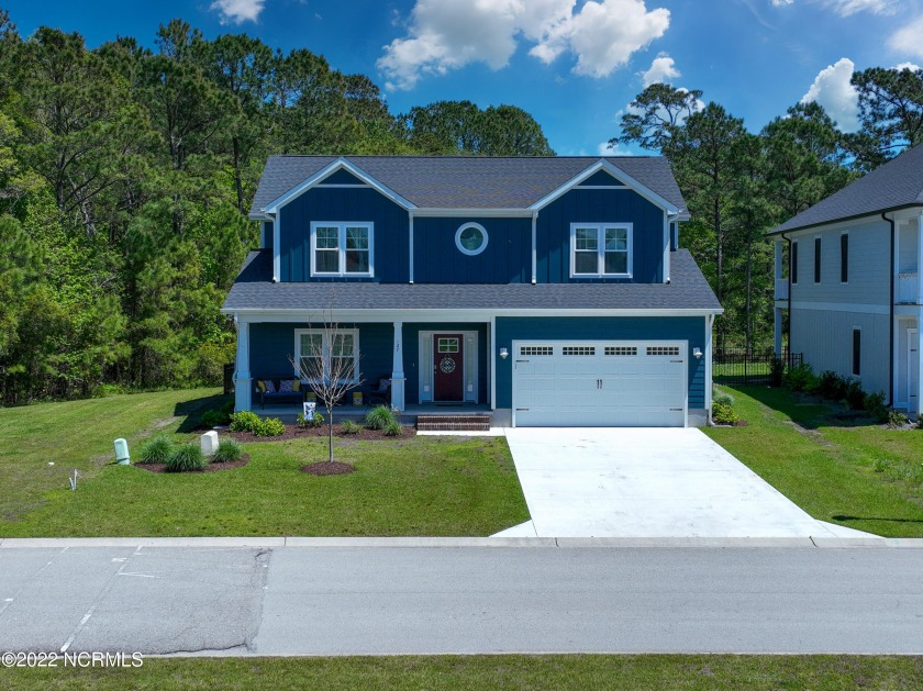 With a spacious open floor plan and very nice finishes, this - Beach Home for sale in Holly Ridge, North Carolina on Beachhouse.com