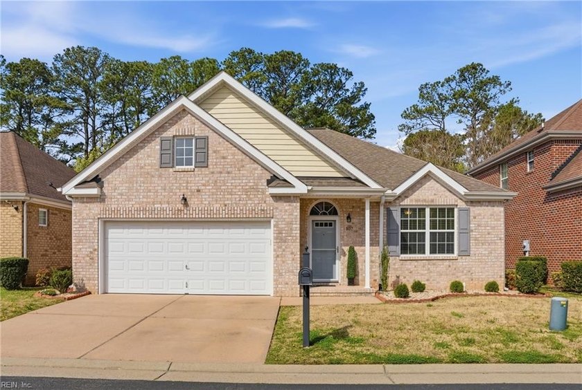 Welcome to this well-maintained brick ranch located in the gated - Beach Home for sale in Portsmouth, Virginia on Beachhouse.com