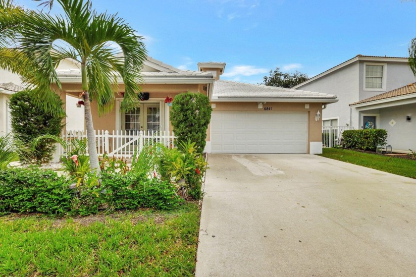 Welcome home to this charming 3-bedroom, 2-bath home offering - Beach Home for sale in Greenacres, Florida on Beachhouse.com