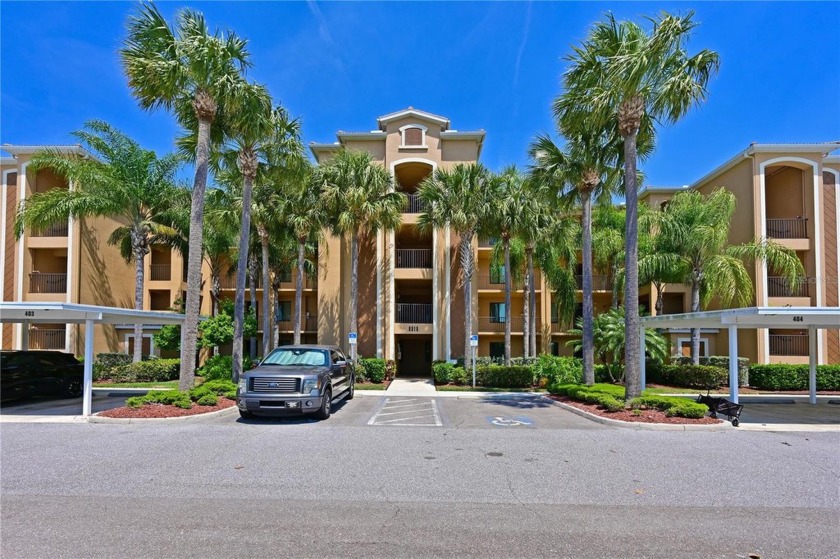 Enjoy panoramic LAKE VIEWS from this TURN-KEY furnished, GOLF - Beach Condo for sale in Bradenton, Florida on Beachhouse.com