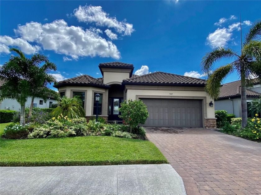 This luxurious Taylor Morrison Lazio model home is an ideal - Beach Home for sale in Sarasota, Florida on Beachhouse.com