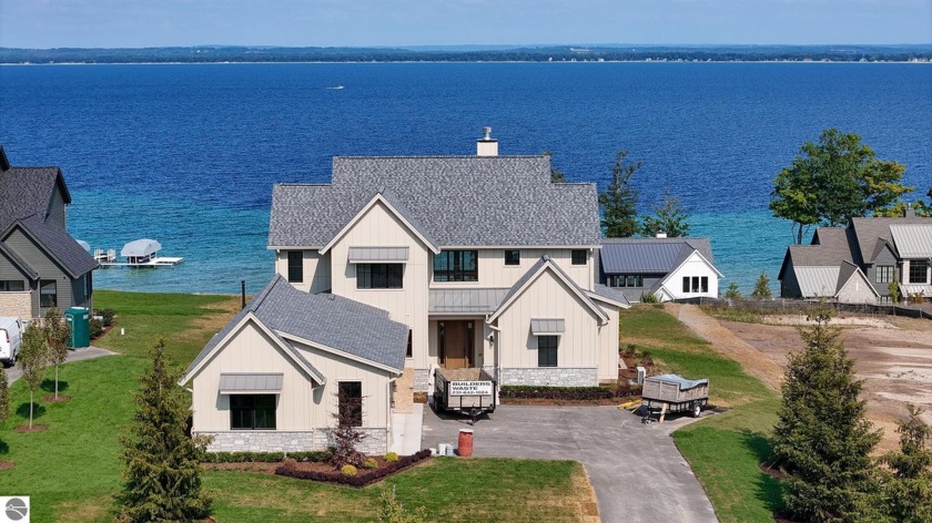 This newly constructed home is nearly ready for move-in, with - Beach Home for sale in Traverse City, Michigan on Beachhouse.com