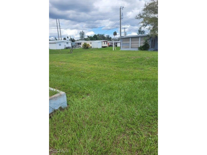 This cleared canal-front lot previously housed a mobile home - Beach Lot for sale in North Fort Myers, Florida on Beachhouse.com
