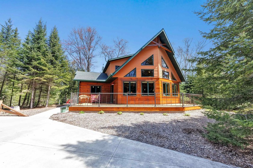 Handcrafted single-owner log cabin-style home located along - Beach Home for sale in Sturgeon Bay, Wisconsin on Beachhouse.com