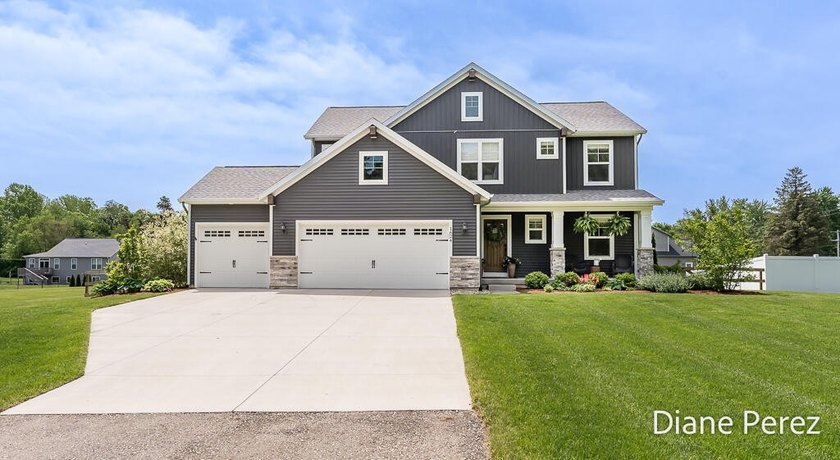 Built in 2022, this impeccable 4-bedroom, 2.5-bath home on - Beach Home for sale in Holland, Michigan on Beachhouse.com