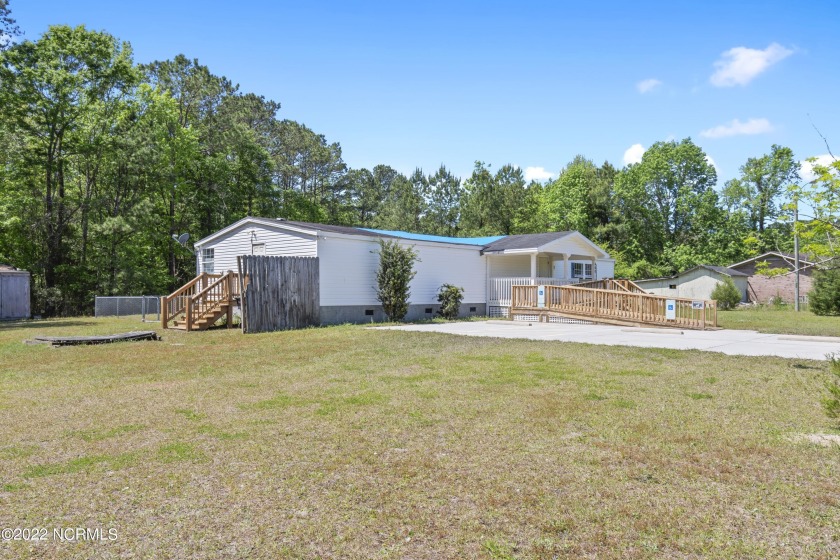 WOW! CHECK OUT THIS HUGE 1900+ SQAURE FOOT BUILING ON 4+ ACRES - Beach Home for sale in Shallotte, North Carolina on Beachhouse.com