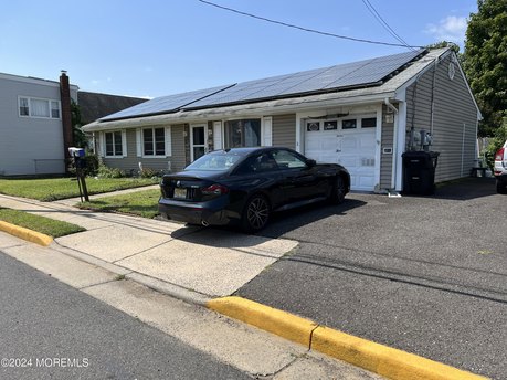 Home situated on a nice lot with a rear deck overlooking a nice - Beach Home for sale in North Middletown, New Jersey on Beachhouse.com