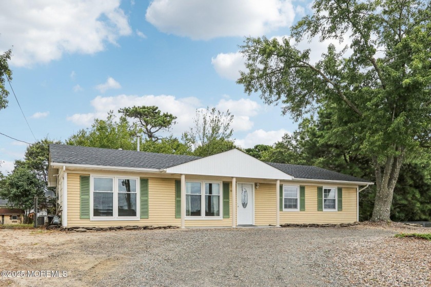 Welcome to this inviting 4-bedroom, 2-bath ranch perfectly - Beach Home for sale in Lanoka Harbor, New Jersey on Beachhouse.com