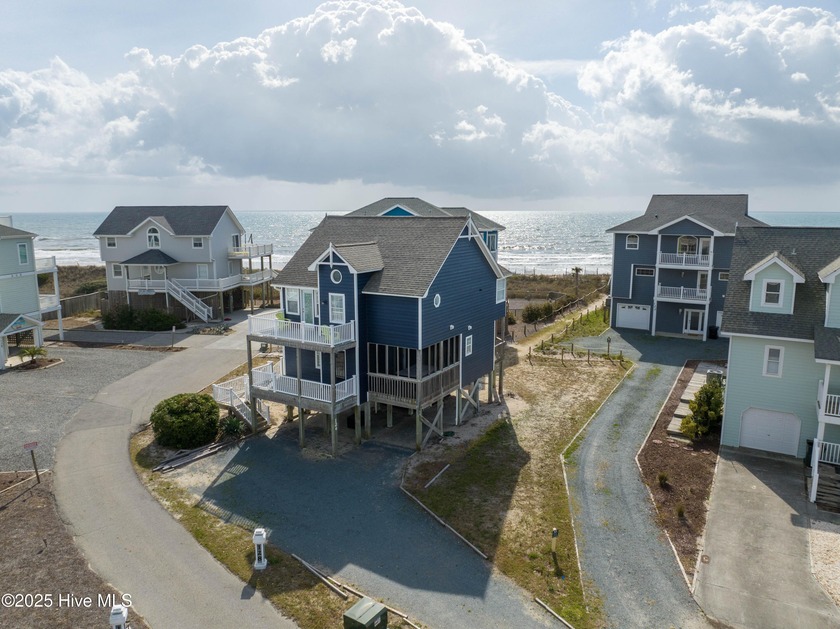 Experience coastal living at its finest in this 4-bedroom, 3 - Beach Home for sale in North Topsail Beach, North Carolina on Beachhouse.com