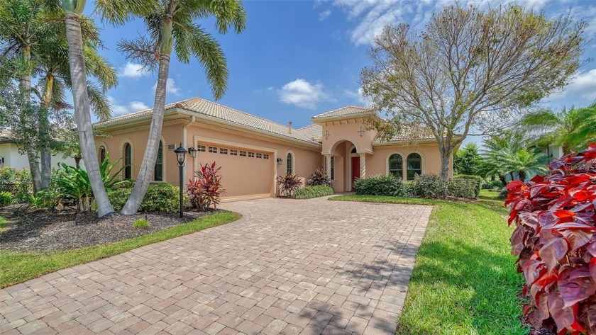 Welcome to this exquisite custom home nestled in the maintenance - Beach Home for sale in Lakewood Ranch, Florida on Beachhouse.com