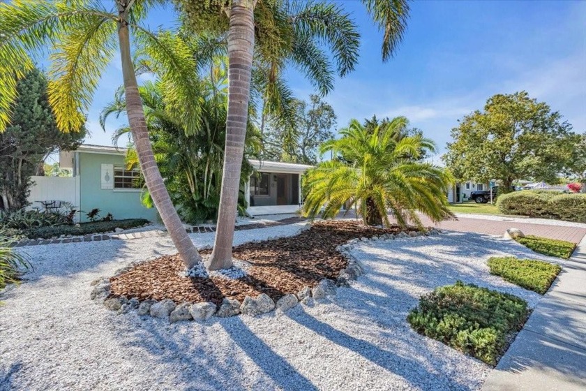 Mid-Century coastal ranch private oasis boasts meticulous - Beach Home for sale in Seminole, Florida on Beachhouse.com