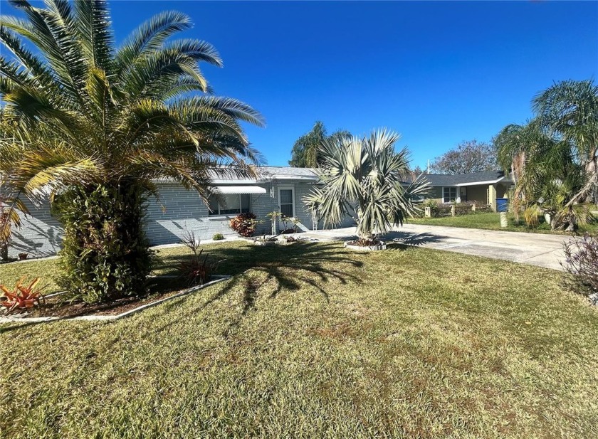 Discover your own private paradise amidst the serene beauty and - Beach Home for sale in Holiday, Florida on Beachhouse.com