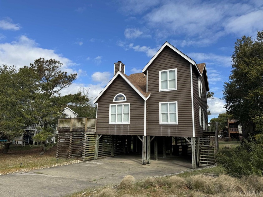 Welcome to 402 W. Deering Street, a charming residence nestled - Beach Home for sale in Nags Head, North Carolina on Beachhouse.com