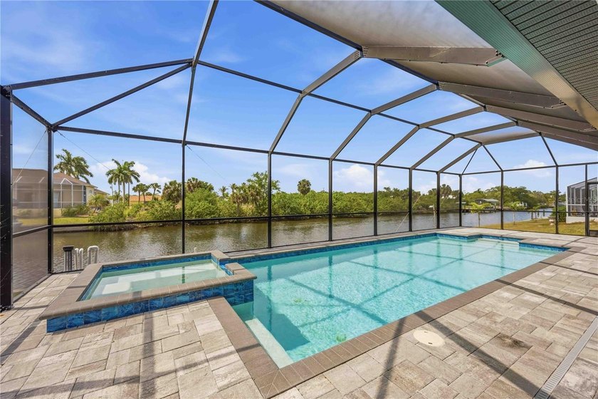 3 BED + DEN | 2 BATH | 80 FT CONCRETE SEAWALL | NO BRIDGES | - Beach Home for sale in Port Charlotte, Florida on Beachhouse.com