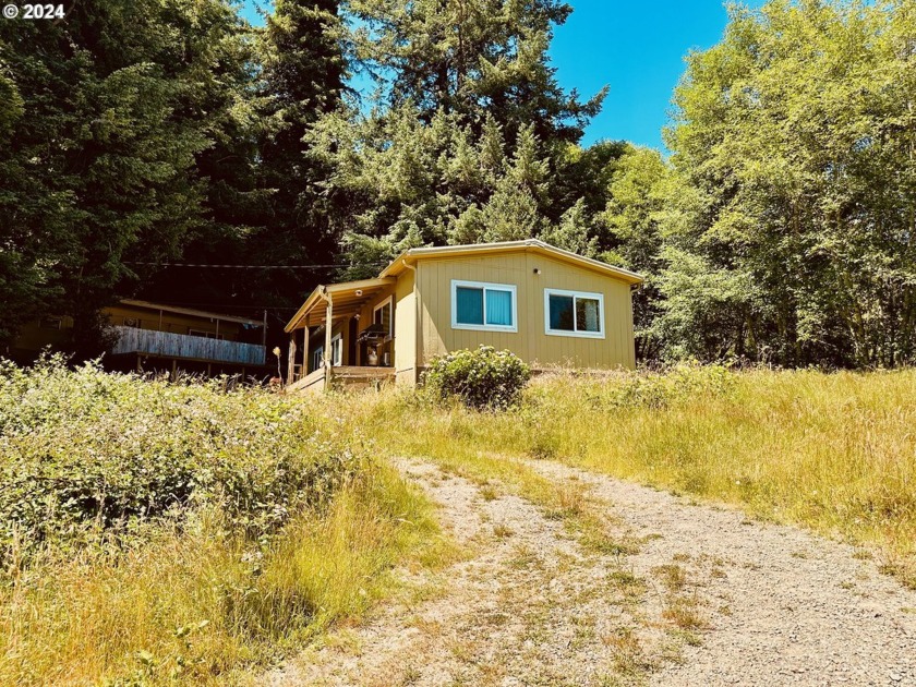 LOCATED A SHORT DISTANCE TO THE BEST FISHING HOLE!! Three - Beach Home for sale in Brookings, Oregon on Beachhouse.com