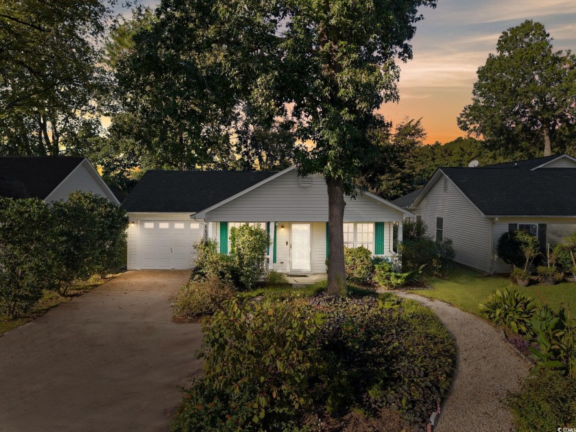 Welcome home to 6623 Cherry Laurel Drive in the gated Myrtle - Beach Home for sale in Myrtle Beach, South Carolina on Beachhouse.com