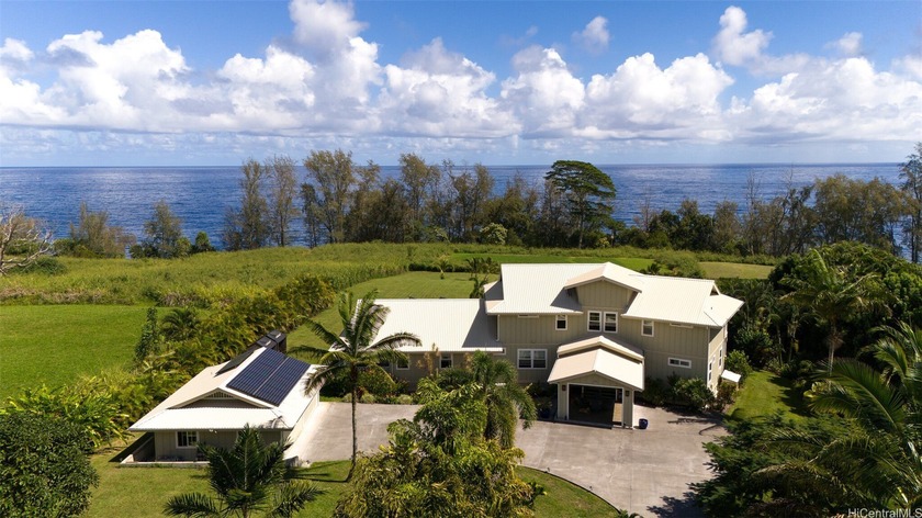Set on 2.42 acres of pristine oceanfront, this 4-bedroom, 5-bath - Beach Home for sale in Pepeekeo, Hawaii on Beachhouse.com