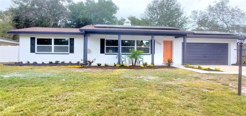 MID-CENTURY 2024 REMODEL!** This one is a show-stopper! The - Beach Home for sale in Largo, Florida on Beachhouse.com