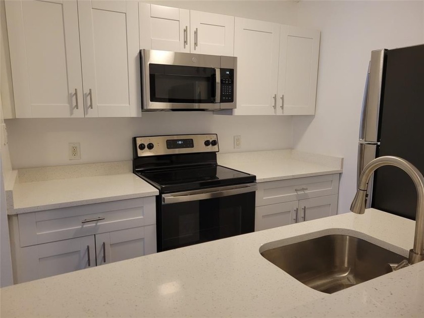 Upgraded 2/1 baths in gated community. This first floor unit is - Beach Condo for sale in Pompano Beach, Florida on Beachhouse.com