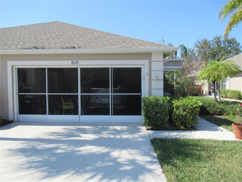 Desirable and upgraded 2/3 bedroom, 2 bath villa with a - Beach Home for sale in North Port, Florida on Beachhouse.com