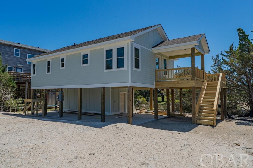 Step into coastal luxury with this newly constructed home - Beach Home for sale in Avon, North Carolina on Beachhouse.com