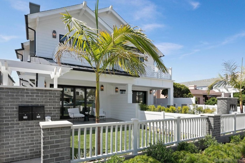 This newly constructed home features a spacious open-concept - Beach Home for sale in Coronado, California on Beachhouse.com