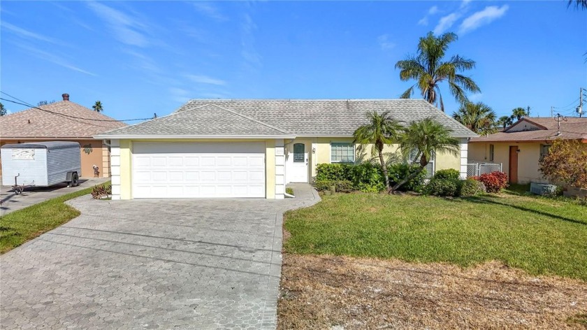 This newly updated 3-bedroom, 3-bathroom pool home offers - Beach Home for sale in New Port Richey, Florida on Beachhouse.com