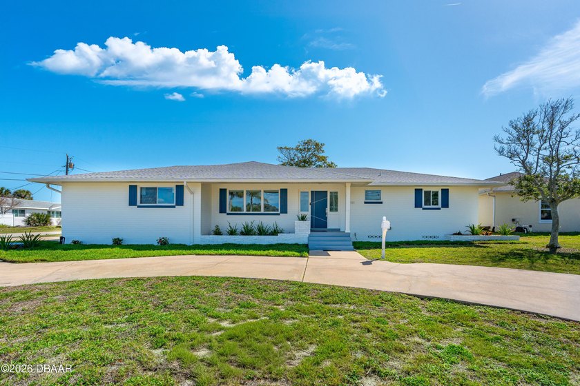 Tucked away in a quiet beachside neighborhood, this beautifully - Beach Home for sale in Daytona Beach, Florida on Beachhouse.com