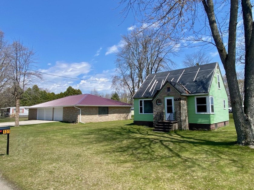 Opportunity meets location at 131 McKinley Street! This 2-story - Beach Lot for sale in Two Rivers, Wisconsin on Beachhouse.com
