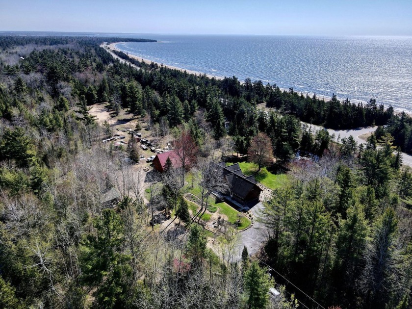 Step onto this nature-inspired 48 Acres with a grand Log home - Beach Home for sale in Manistique, Michigan on Beachhouse.com