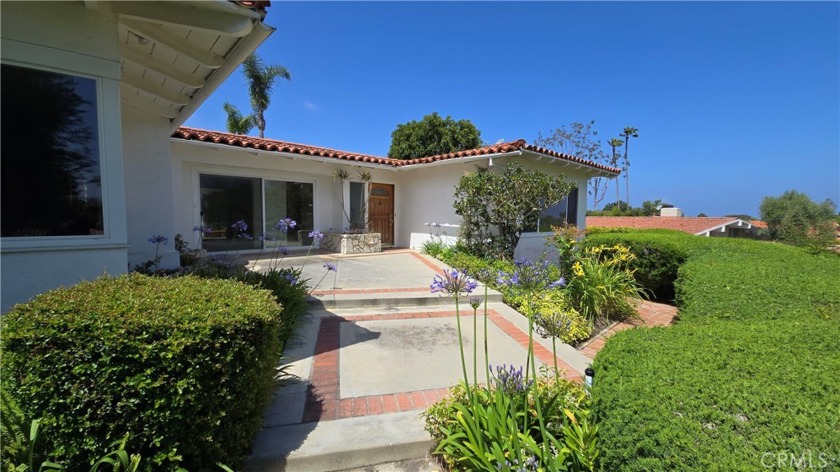 This wonderful family home sits high above street level and - Beach Home for sale in Palos Verdes Estates, California on Beachhouse.com