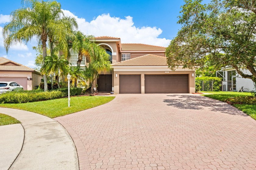 Amazing lakefront pool home tucked away on a quiet cul de sac - Beach Home for sale in Boca Raton, Florida on Beachhouse.com