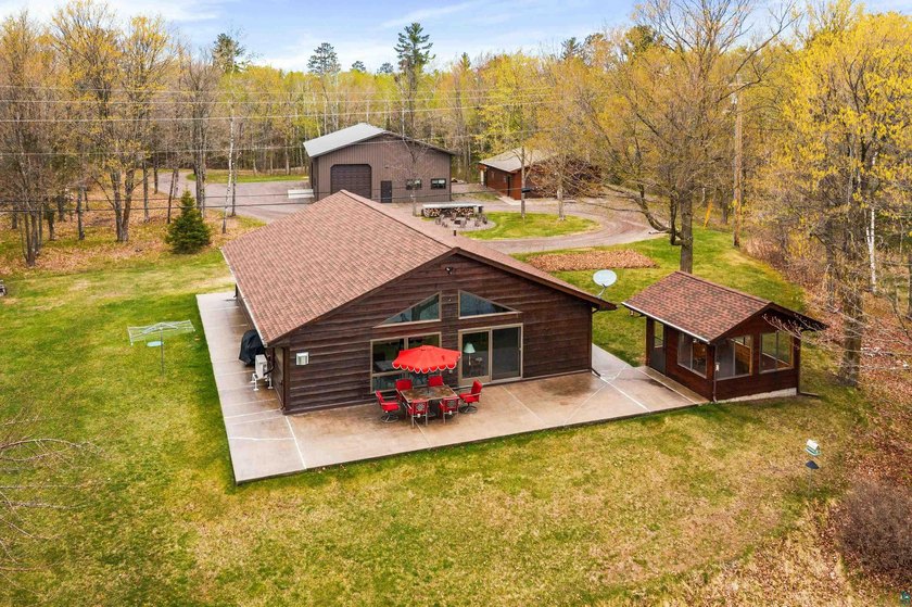 Nestled on 7 private acres with 225 feet of sandy Lake shoreline - Beach Home for sale in Duluth, Minnesota on Beachhouse.com