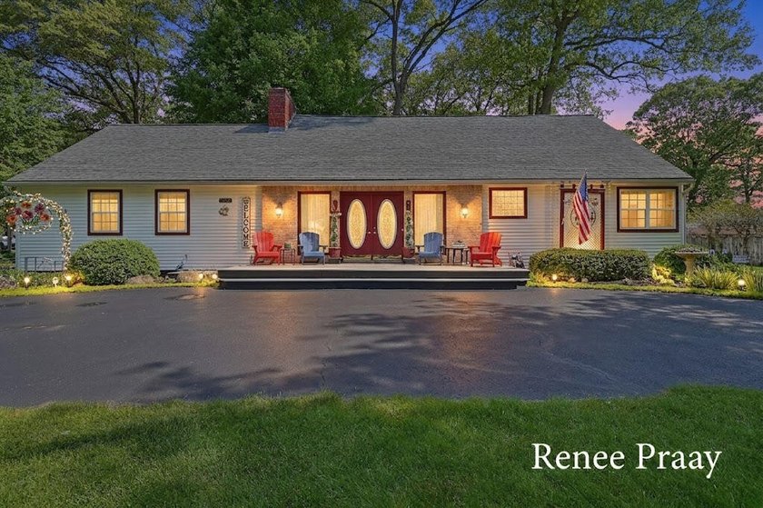 Beautiful four-bedroom, two-bath home featuring two stunning - Beach Home for sale in Muskegon, Michigan on Beachhouse.com