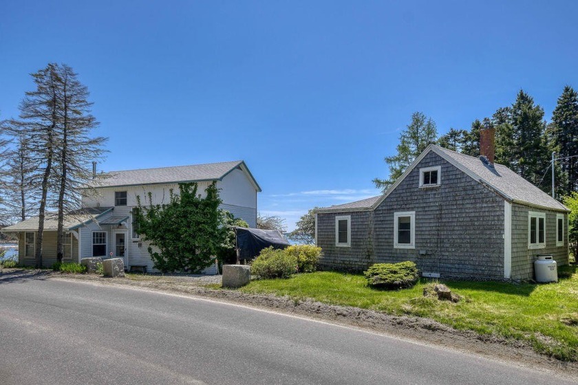 Two west-facing waterfront cottages on Sand Beach Road offer a - Beach Home for sale in Stonington, Maine on Beachhouse.com