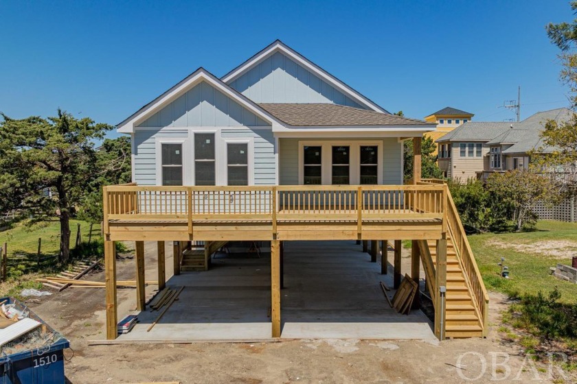 Nestled in the heart of Avon, this stunning new construction - Beach Home for sale in Avon, North Carolina on Beachhouse.com